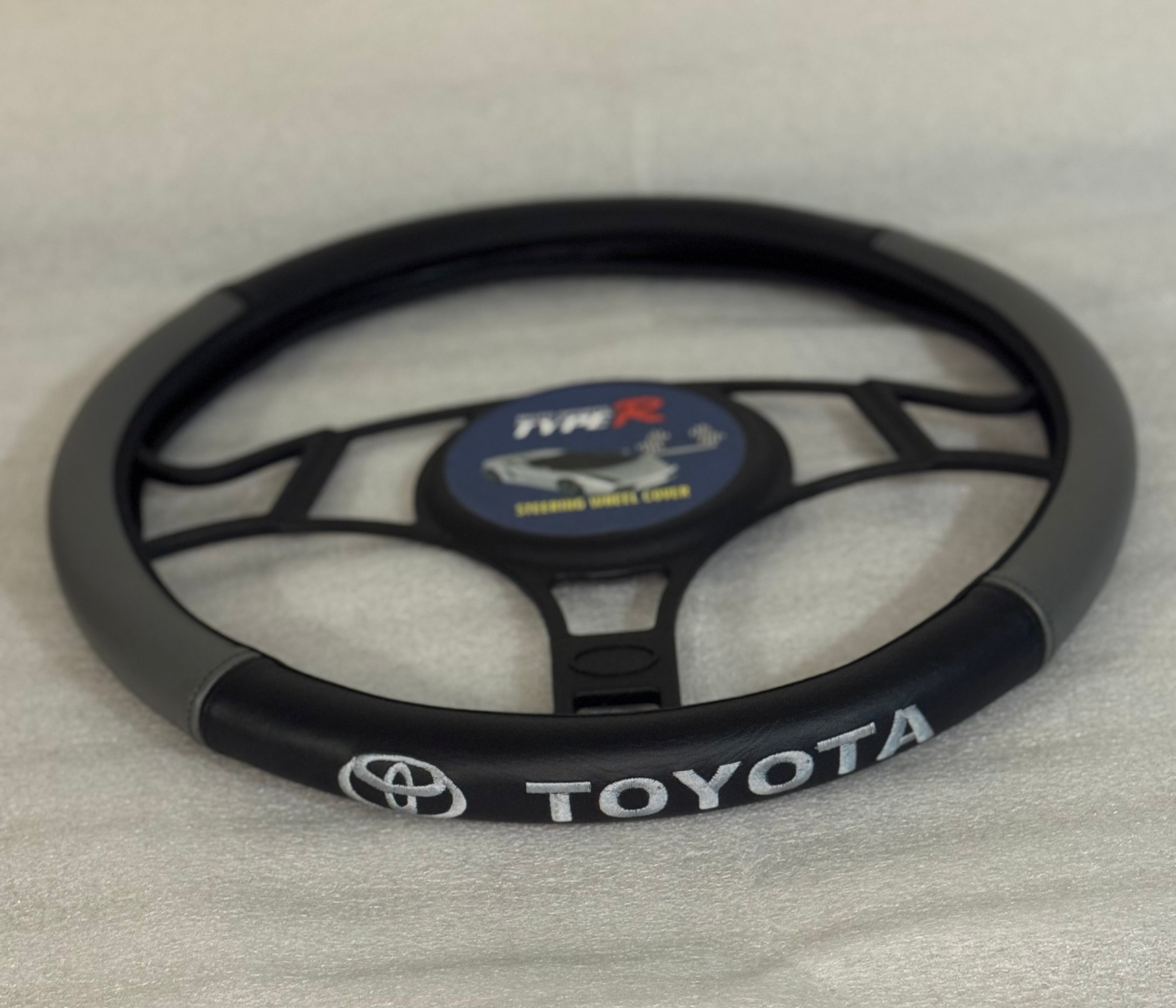 Cover Toyota gris/negro